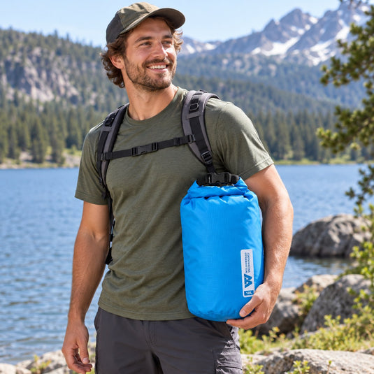 Wilderness Technology Ultralight Dry Bag 10L in Dark Teal, in use outdoors
